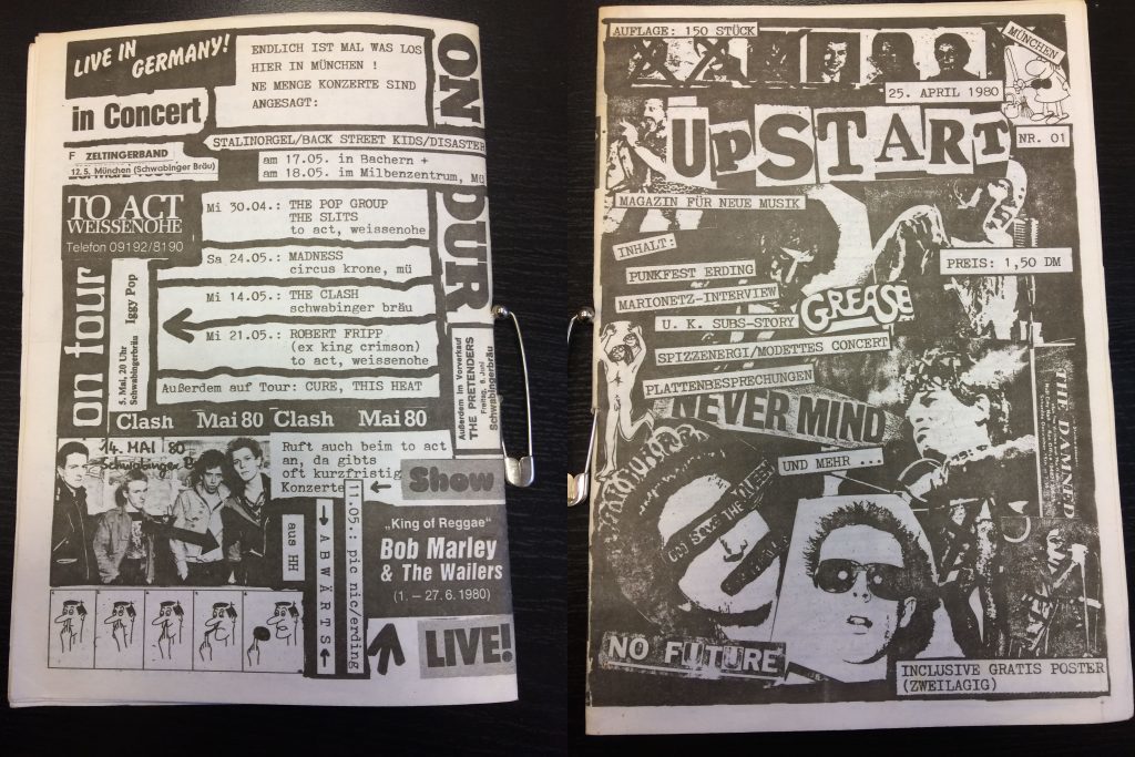 Cover und Rückseite der ersten Ausgabe des Fanzines „Upstart“ von Peter Wacha, geheftet mit einer Sicherheitsnadel, eines der Symbole des Punk.